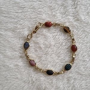 Scarab gold tone bracelet